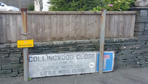 Damaged street nameplate